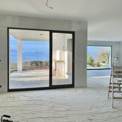Fabrication et Pose d'une menuiserie Aluminium Slim Line SL38 dans une Villa à Lutry