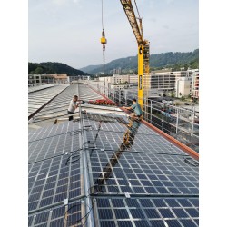 Toiture Solaire à Zurich Green-City en verre bi-PV et système Poteaux-Traverse